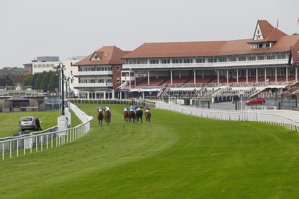 Horses Heading Into The Home Straight At Chester Racecourse During The First Behind Closed Doors Fixture